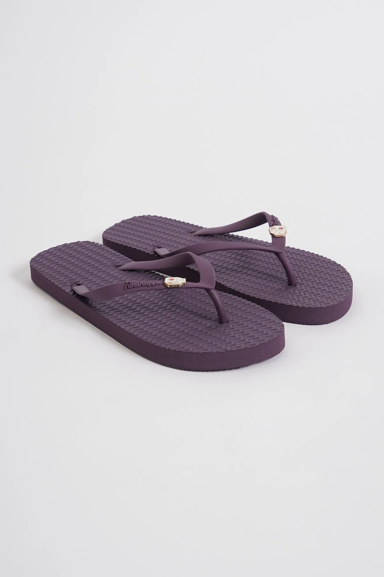 Women's Textured Flip Flops with Metal Pin