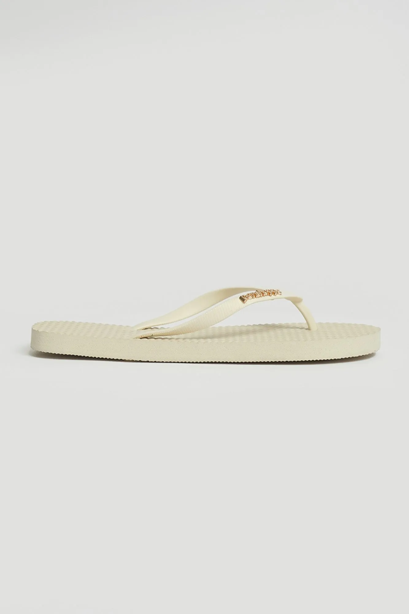 Women's Textured Sole Flip Flops with Metal Branding